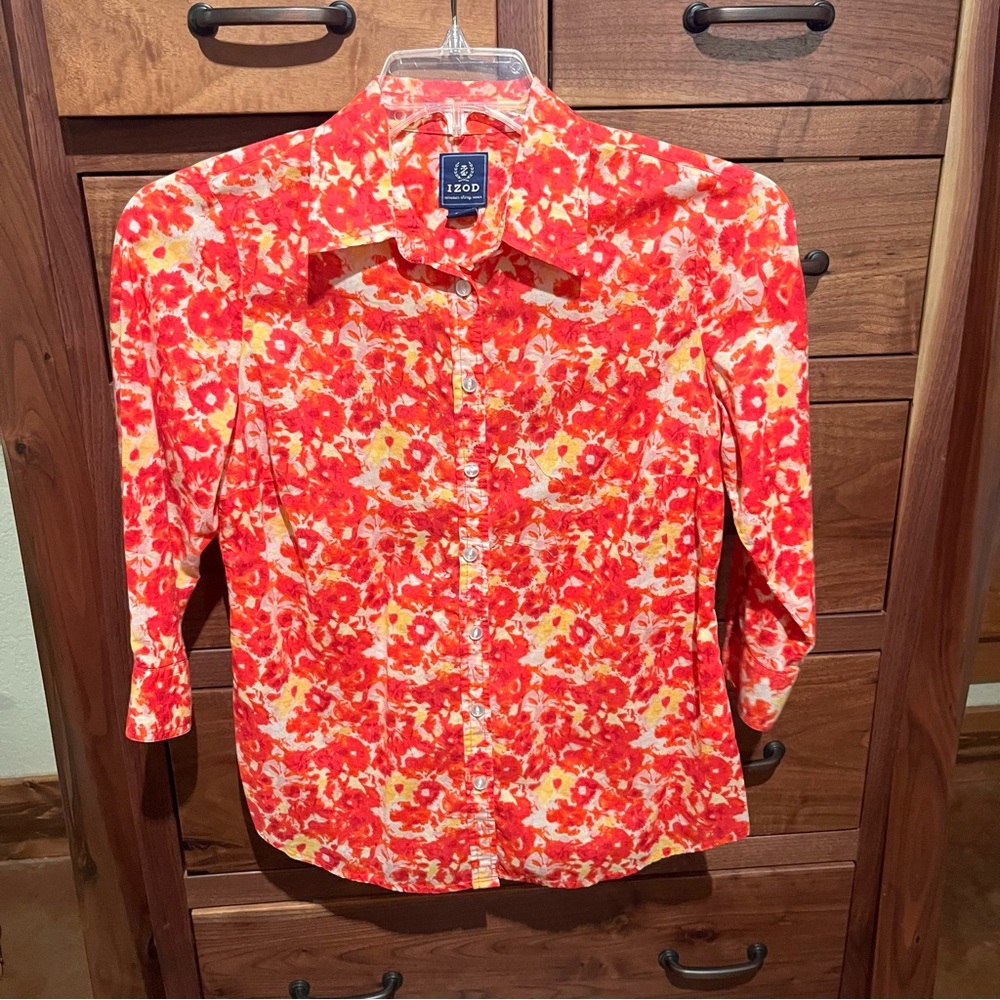 IZOD top. Rep orange white and yellow button down collared top. Mid sleeve.